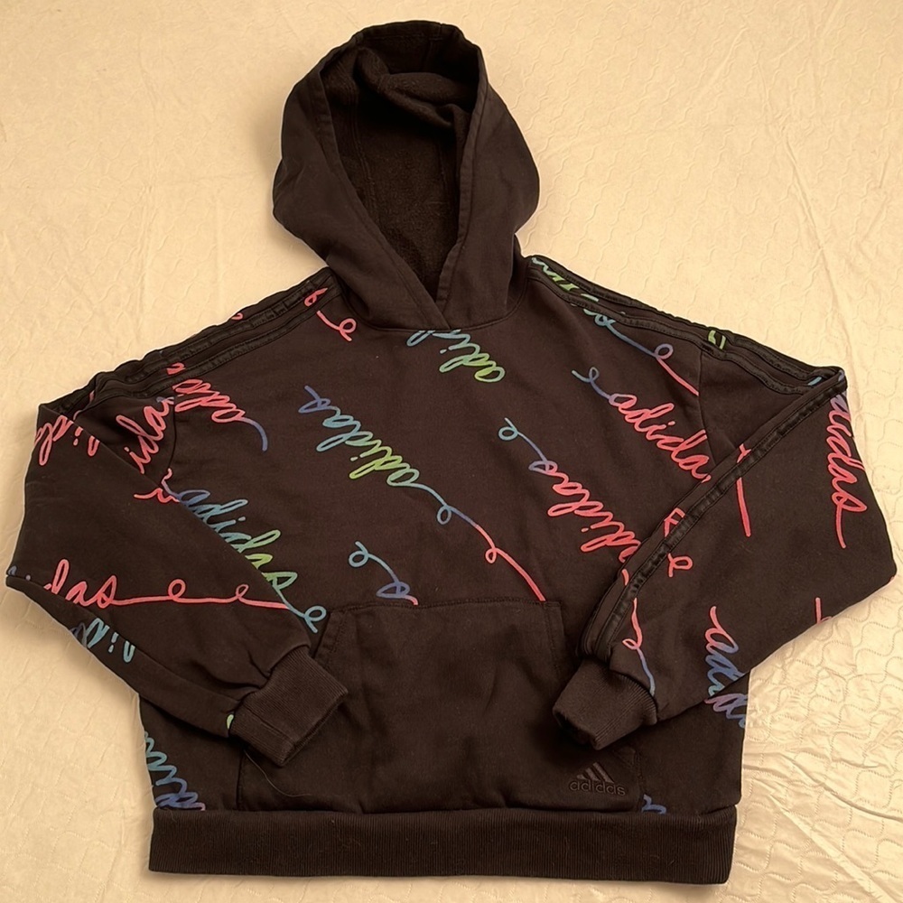 Adidas black hoodie with rainbow cursive all-over logo M = 10-12